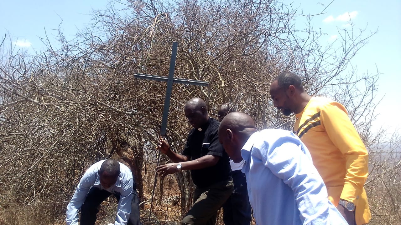 K-CFA member planting a seedling